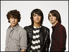 Reference photo of the Jonas Brothers used to create a custom hand-drawn caricature